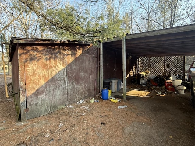 view of property exterior featuring an outbuilding