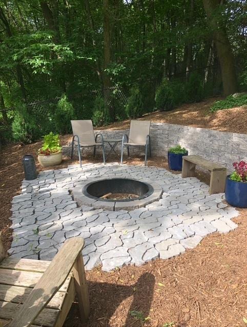 view of patio / terrace with a fire pit