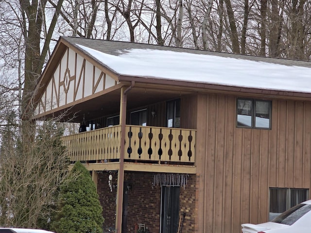 view of property exterior featuring brick siding