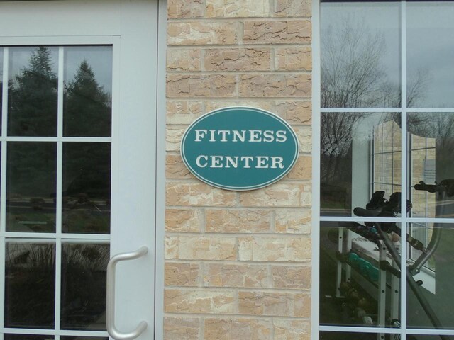 exterior details featuring stone siding