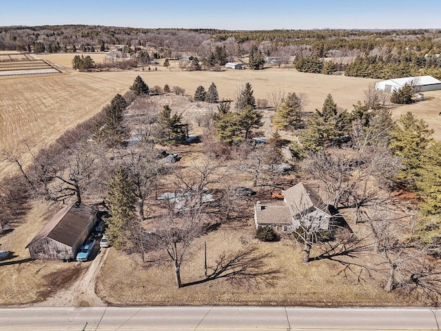 birds eye view of property featuring a rural view