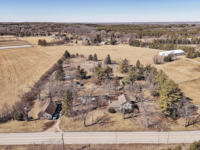 birds eye view of property with a rural view