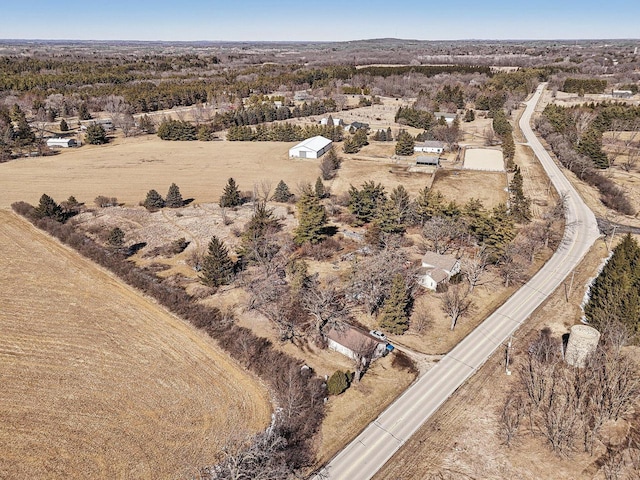 birds eye view of property featuring a rural view