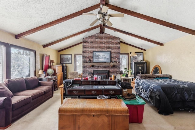 living room with a textured wall, ceiling fan, vaulted ceiling with beams, carpet, and a textured ceiling