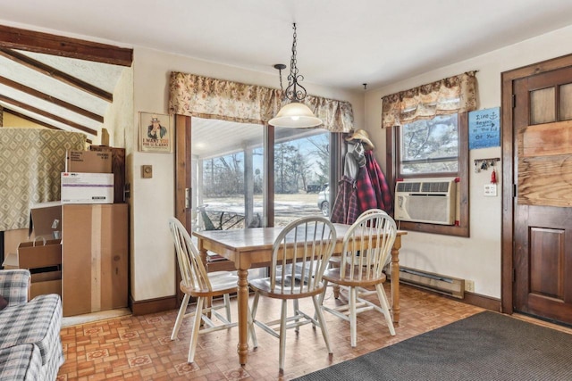 dining room with a baseboard radiator, baseboards, and cooling unit