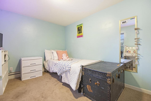 carpeted bedroom featuring baseboards