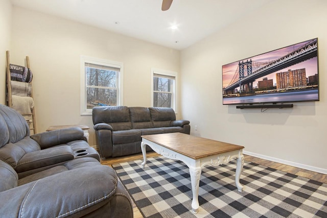 living area with ceiling fan, recessed lighting, wood finished floors, and baseboards