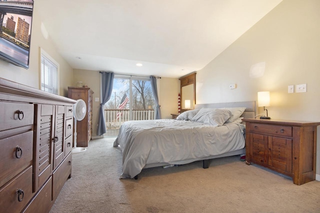 bedroom with access to exterior, recessed lighting, light colored carpet, and multiple windows