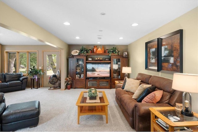 living area featuring carpet and recessed lighting