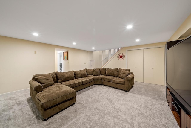 living room with carpet flooring and recessed lighting