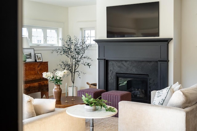 sitting room featuring a fireplace