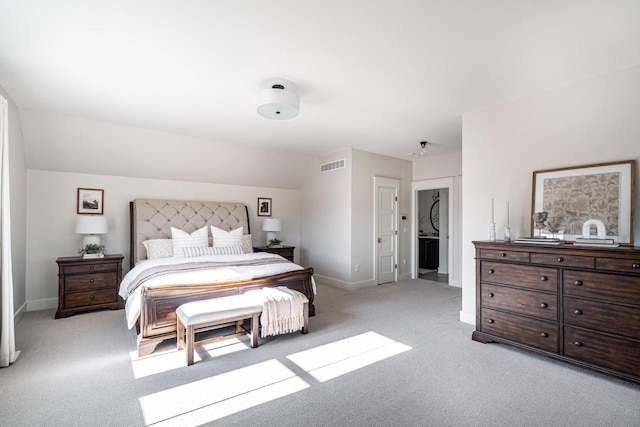 bedroom featuring visible vents, light carpet, and baseboards