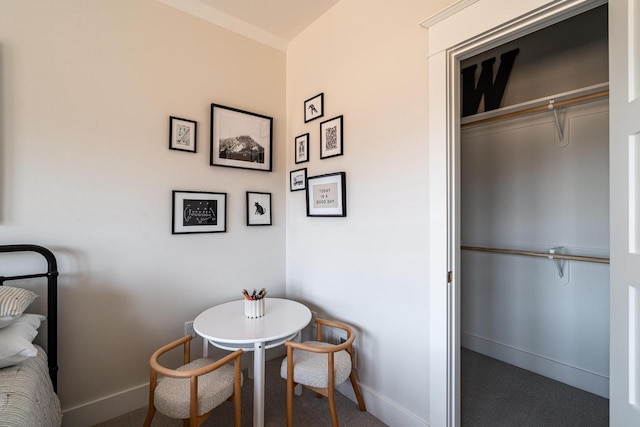 dining space featuring baseboards