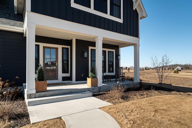 property entrance with a porch and board and batten siding