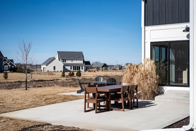 view of patio / terrace featuring entry steps and outdoor dining area