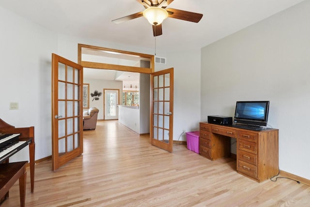 office with visible vents, french doors, baseboards, and light wood-style floors