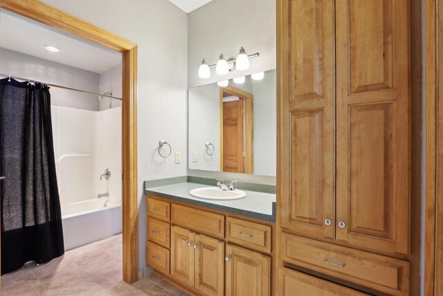 full bathroom featuring vanity and shower / bath combo