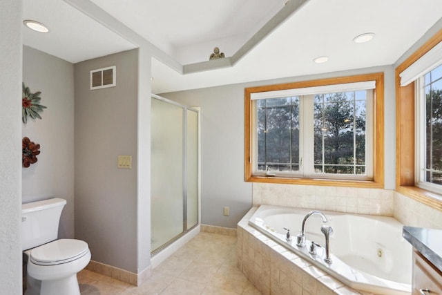 bathroom featuring a tub with jets, visible vents, a stall shower, tile patterned flooring, and toilet