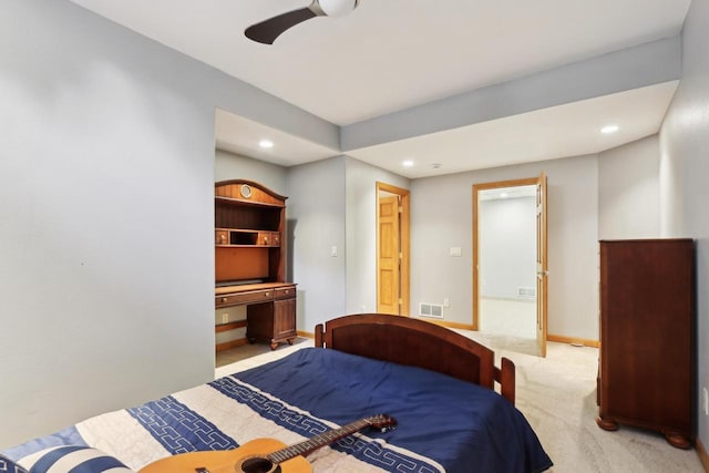 carpeted bedroom featuring recessed lighting, visible vents, baseboards, and a ceiling fan