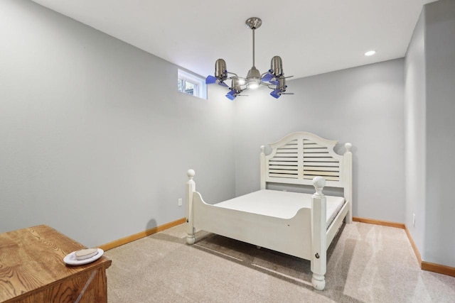 carpeted bedroom with recessed lighting, baseboards, and a notable chandelier