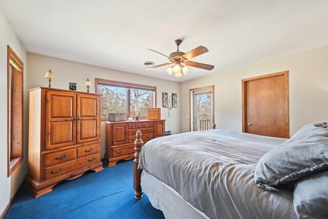 carpeted bedroom with access to exterior, visible vents, and ceiling fan