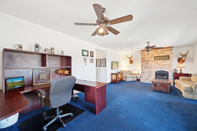 home office with a ceiling fan, a fireplace, and carpet floors