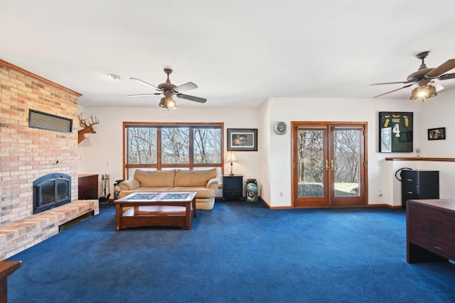 living room featuring french doors, carpet floors, baseboards, a brick fireplace, and ceiling fan