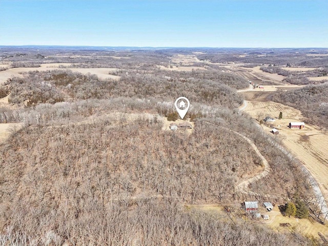 birds eye view of property featuring a rural view