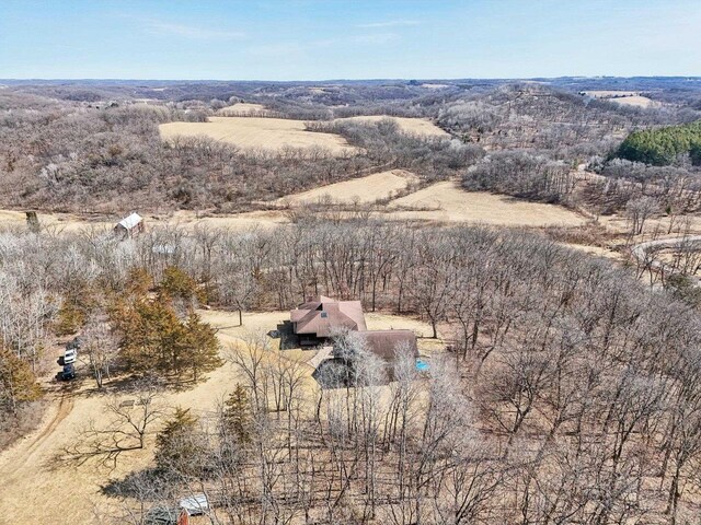 birds eye view of property featuring a rural view