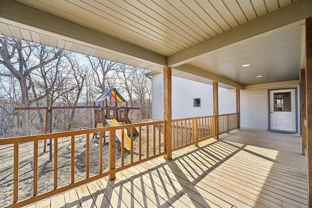 wooden deck with a playground