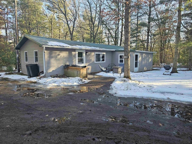 view of front of home featuring metal roof