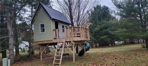 exterior space featuring a wooden deck