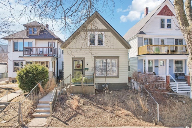 view of front of property with a balcony