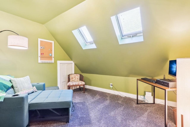 carpeted bedroom featuring baseboards and vaulted ceiling