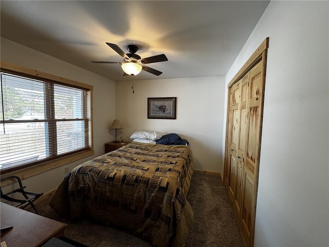 bedroom featuring a closet, ceiling fan, and carpet flooring