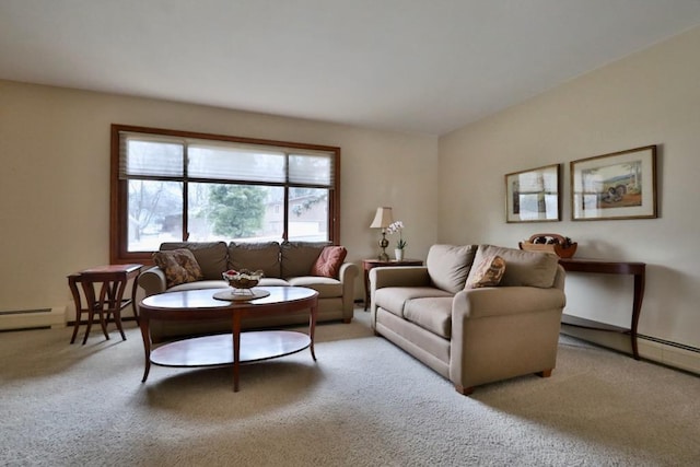 living area featuring a baseboard heating unit and carpet flooring