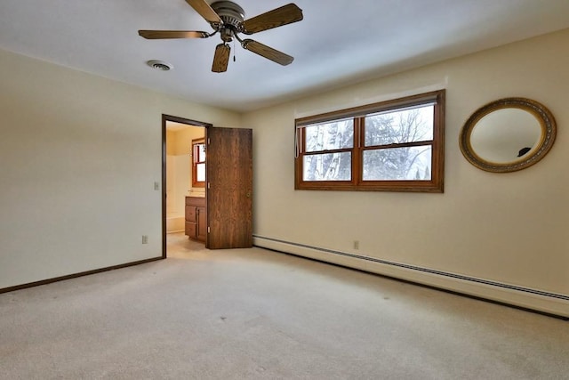 unfurnished room featuring light carpet, baseboards, visible vents, ceiling fan, and a baseboard heating unit