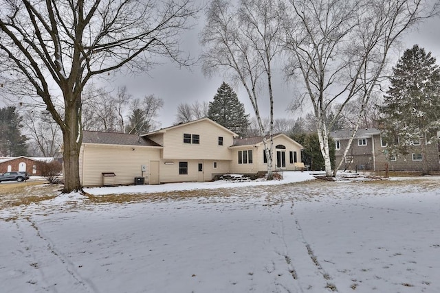 view of snow covered property