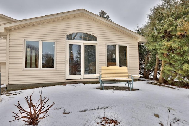 view of snow covered property