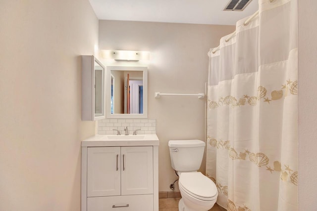 bathroom with tasteful backsplash, visible vents, toilet, vanity, and tile patterned flooring