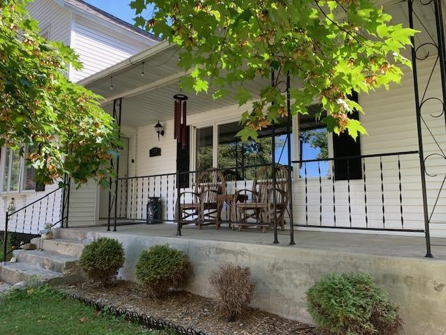 entrance to property with a porch