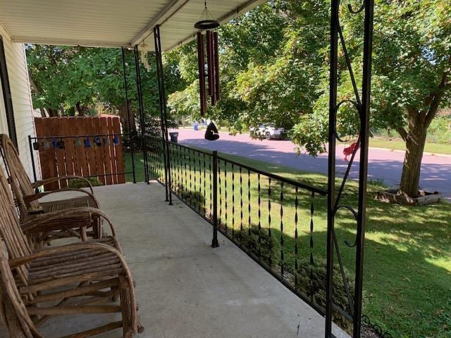 balcony featuring a porch