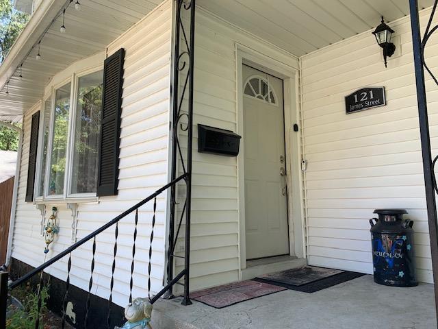 entrance to property with a porch