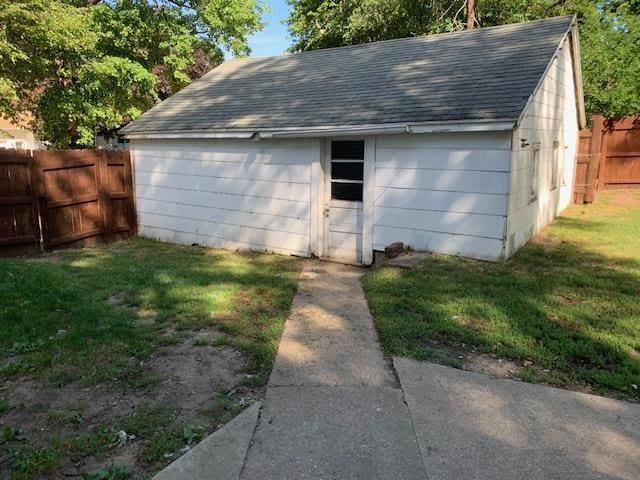 garage featuring fence