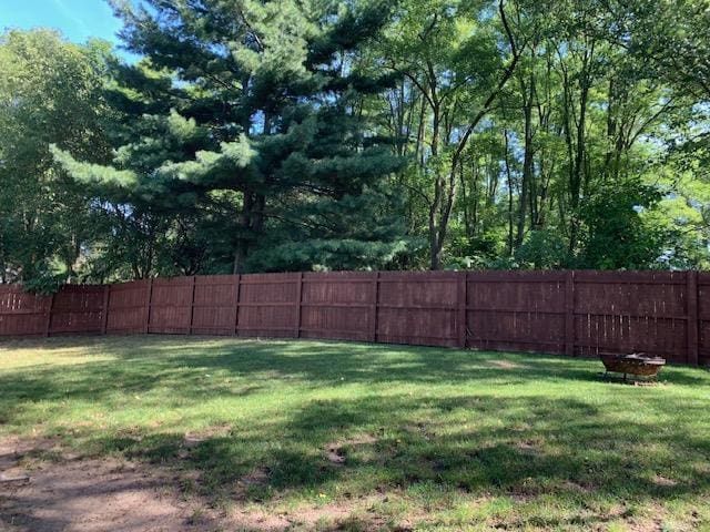 view of yard featuring fence