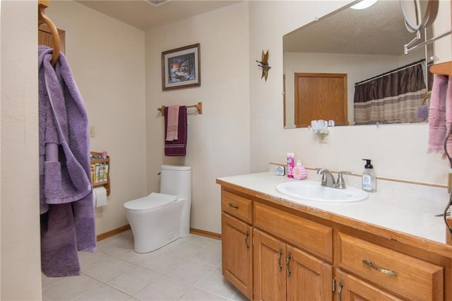 full bathroom featuring baseboards, toilet, a shower with curtain, tile patterned floors, and vanity