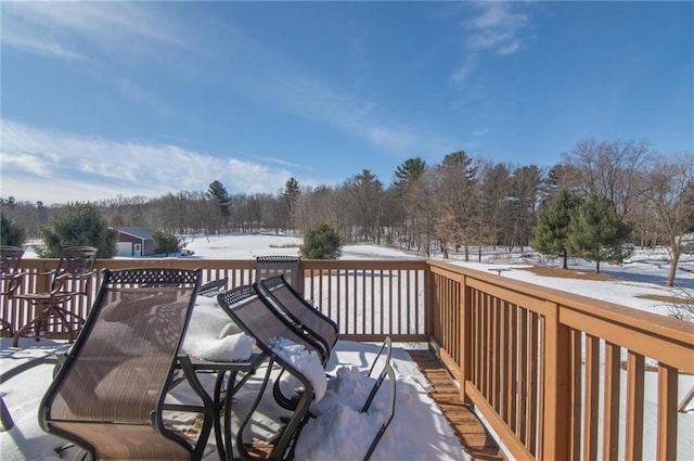 view of snow covered deck