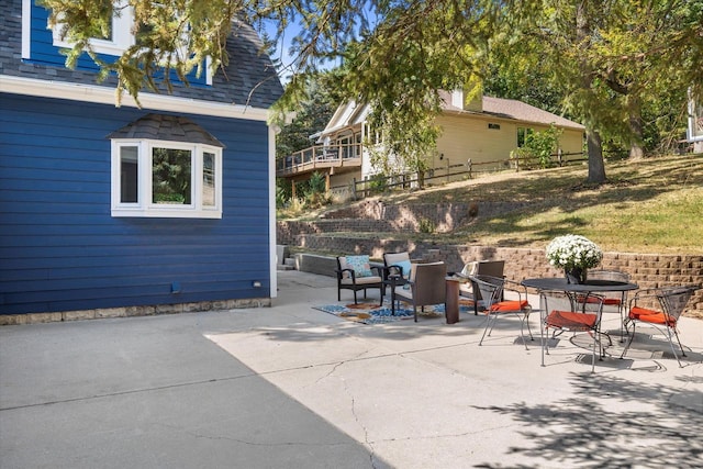 view of patio / terrace featuring fence