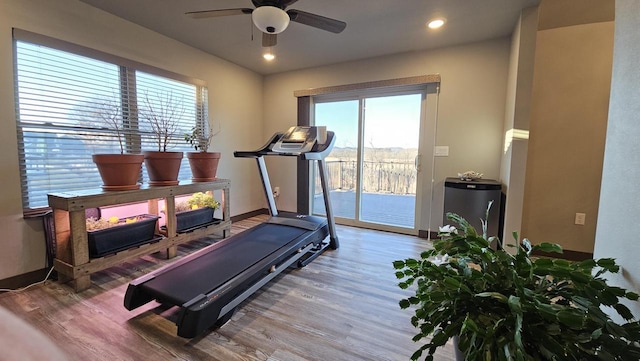 exercise area with ceiling fan, baseboards, wood finished floors, and recessed lighting