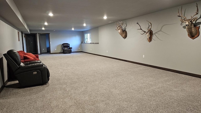 interior space with carpet, baseboards, and recessed lighting